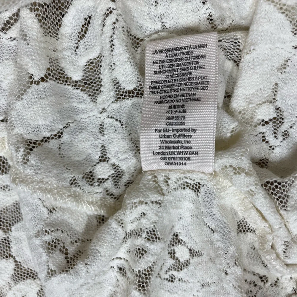 Free People “Miles of Lace” Cream Fit & Flare Dress